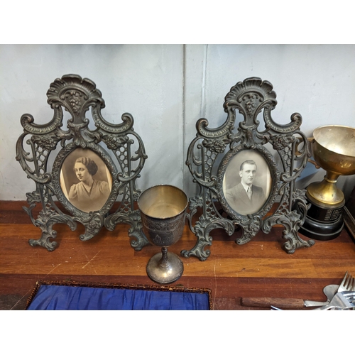 455 - Mixed silver plate and silver items to include two photo frames, a goblet, spoons, knives and forks,... 