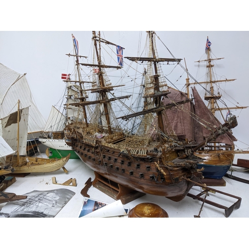 463 - A fleet of wooden model sailing vessels to include a large three-masted model of HMS Victory, and a ... 