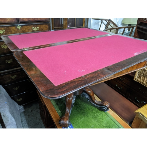 478 - A William IV rosewood swivel top folding card table, fluted octagonal baluster column support above ... 