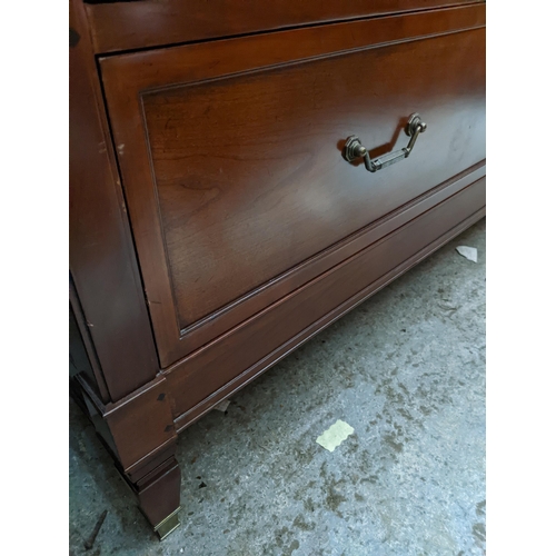 486 - A Wills and Gambier reproduction mahogany side chest of drawers, single narrow long drawer, above th... 