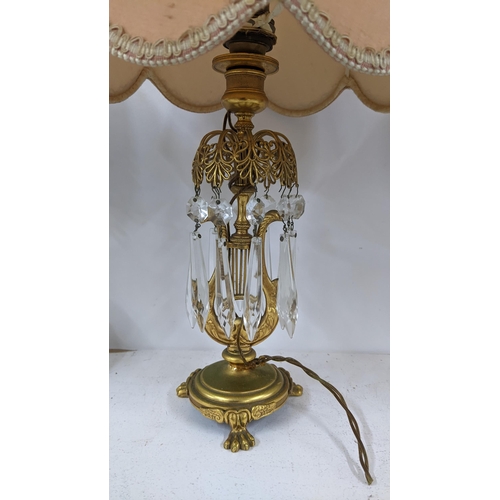 503 - Two gilt metal French table lamps including an early 20th century drop example with lyre centre
Loca... 