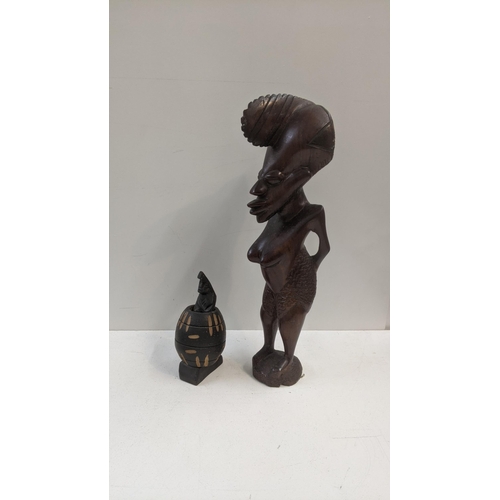 511 - Two treen items to include a figure of a man in a barrel and one other
Location:R2.5
If there is no ... 