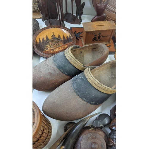 515 - Mixed treen items and collectables to include a set of coasters, wall hanging tribal masks and other... 