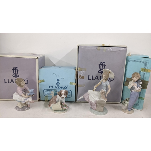 543 - Four boxed Lladro figures to include 7612 'Picture Perfect' and others, stamped Collectors Society
L... 