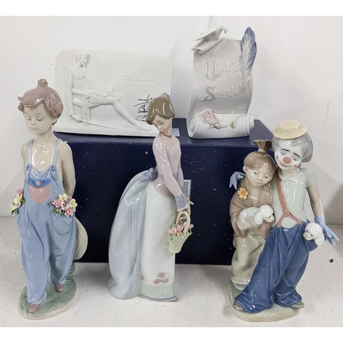 545 - Three Lladro society figures together with two porcelain plaques, one figure boxed, stamped Collecto... 