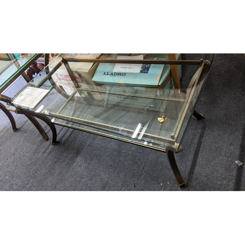 548 - A John Lewis 'Villa D'este' glass topped two tier coffee table and matching side table, with origina... 