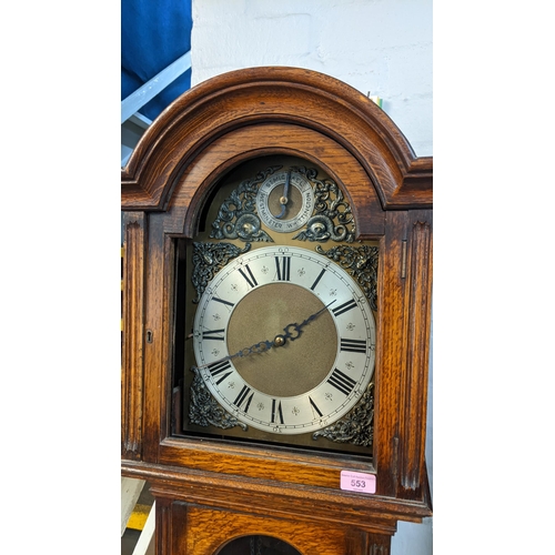 553 - An early/mid 20th century oak longcase clock having a selection dial for Westminster, St Michael and... 