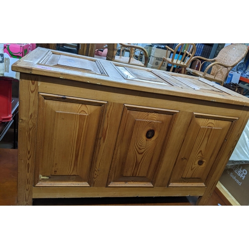 588 - A small 20th century pine chest, triple panelled top and front and sides, on block feet, 56 x 88 x 4... 