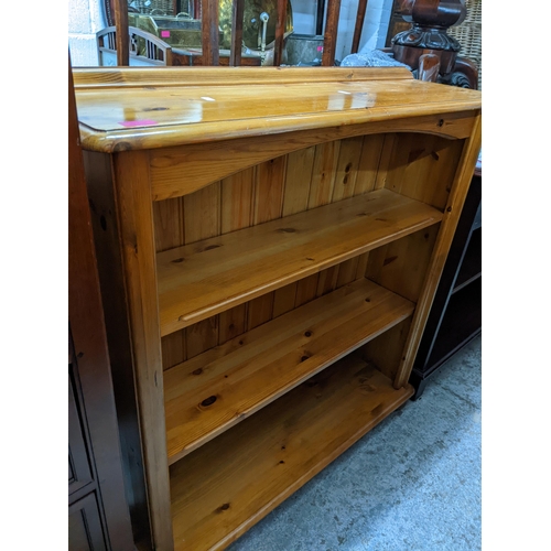 588 - A small 20th century pine chest, triple panelled top and front and sides, on block feet, 56 x 88 x 4... 