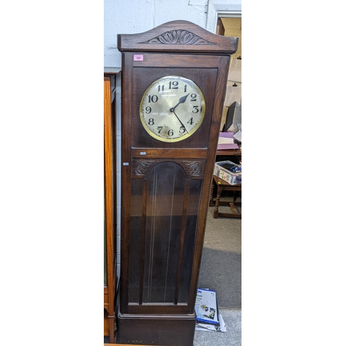 589 - An early to mid oak cased longcase clock, silver brass dial with Arabic numerals, glazed pendulum do... 