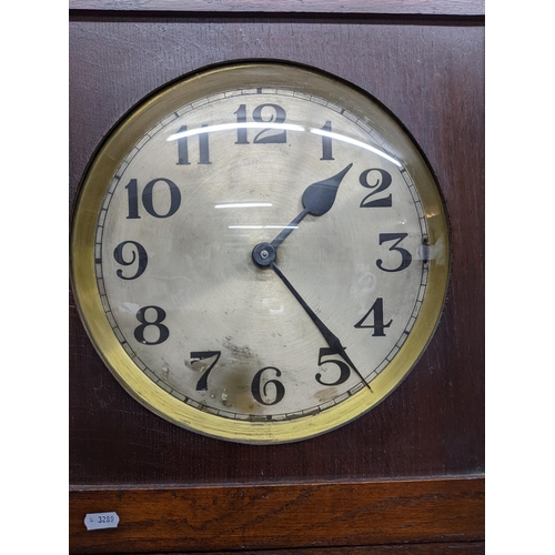 589 - An early to mid oak cased longcase clock, silver brass dial with Arabic numerals, glazed pendulum do... 