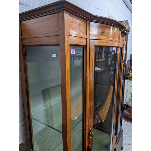 590 - Edwardian inlaid mahogany bow fronted display cabinet, floral decoration in the Art Nouveau style, g... 