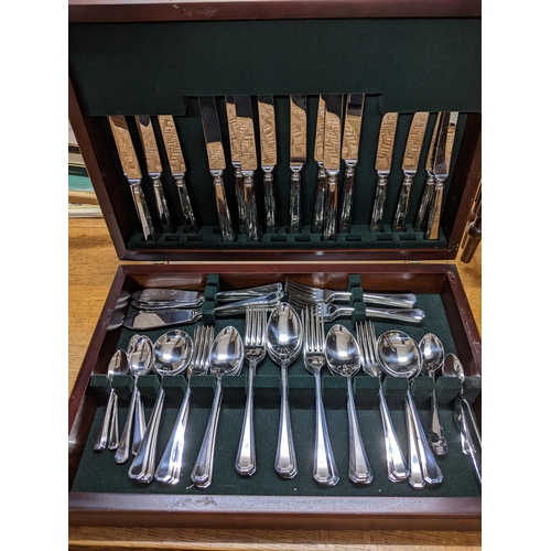 592 - A mahogany canteen of stainless steel cutlery
Location: G
If there is no condition report shown, ple... 