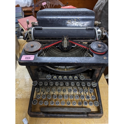 595 - A vintage L C Smith and Bros typewriter, and a metal cased mid-century Imperial Good Companion typew... 