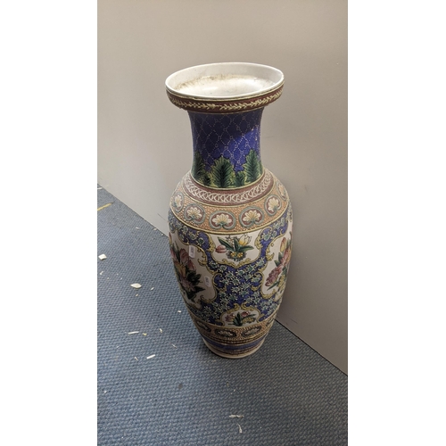 608 - A large 20th century Chinese vase decorated with floral motifs and repeating patterns 62cm h Locatio... 