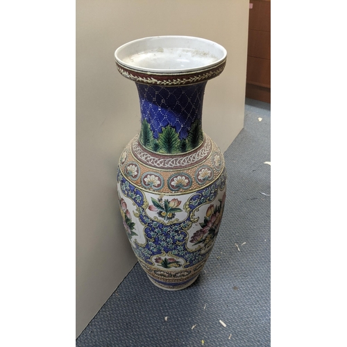 608 - A large 20th century Chinese vase decorated with floral motifs and repeating patterns 62cm h Locatio... 