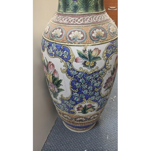 608 - A large 20th century Chinese vase decorated with floral motifs and repeating patterns 62cm h Locatio... 