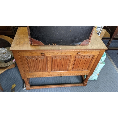 621 - Two reproduction oak carved cabinets, each having cupboard doors
Location:RAB