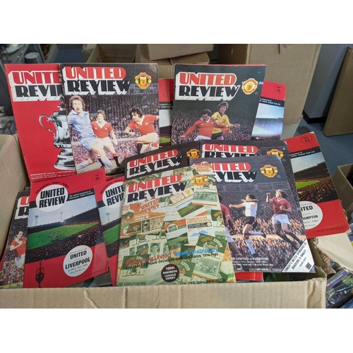 624 - A large collection of Manchester United football and others to include Southampton, West Ham, Port V... 