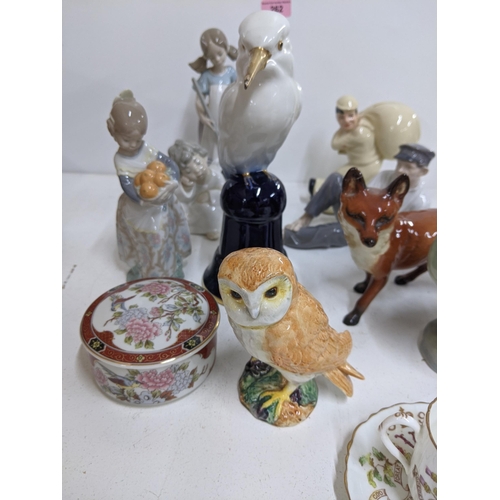 262 - A mixed lot of ceramics to include three Lladro figures, two Beswick models, a Royal Copenhagen figu... 