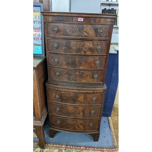 505 - A reproduction mahogany chest on chest having graduated drawers 139cm h x 58cm w x 42cm d Location: ... 