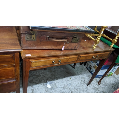 581 - An Edwardian mahogany three drawer chest, 81cm h x 91cm w, and a later mahogany two drawer table, 75... 