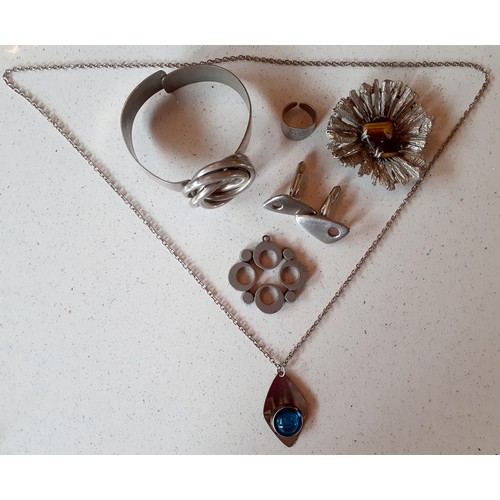 41 - A 1970's Swedish RTenn Modernist pendant and a small quantity of Retro silver tone and stainless jew... 