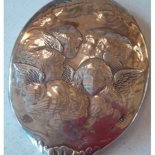 36 - A silver hand mirror decorated with cherubs, makers mark W.C together with a pair of gold tone lorgn... 