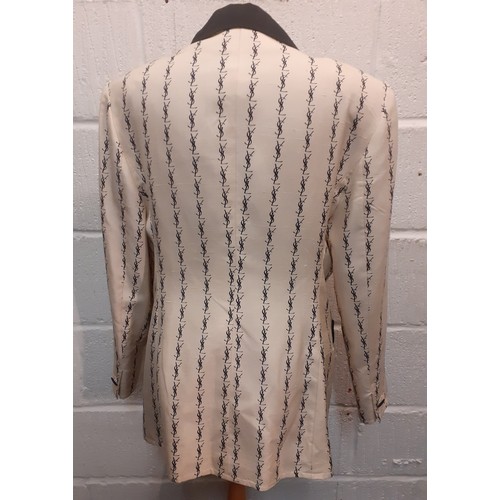 3 - YSL-An early 1980's 'Variation' line cream silk jacket having a monogram design in black throughout,... 