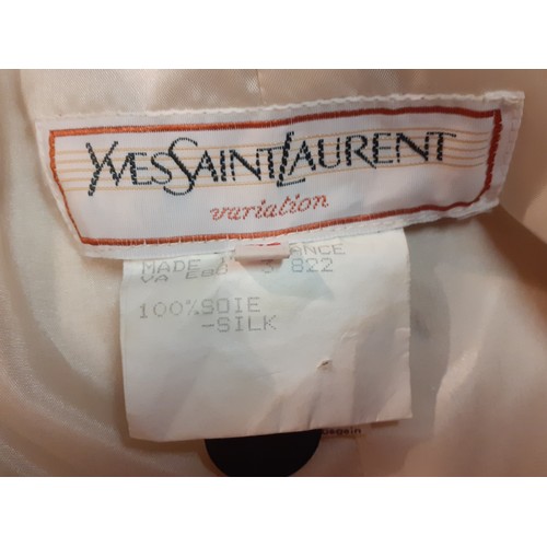 3 - YSL-An early 1980's 'Variation' line cream silk jacket having a monogram design in black throughout,... 