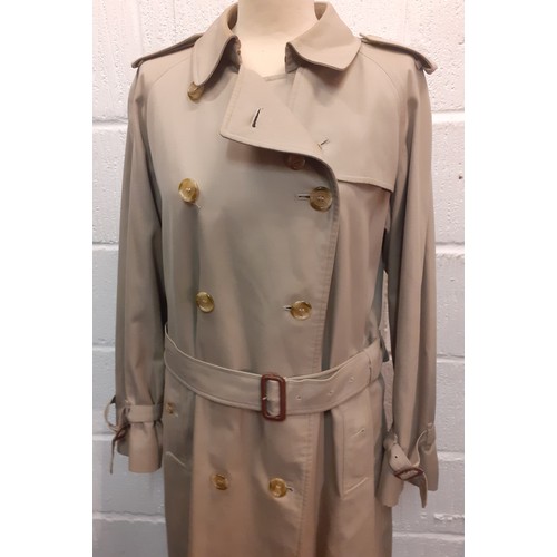 12 - Burberry-A 1970's beige double breasted 'Kensington' lightweight cotton trench coat having brown lea... 