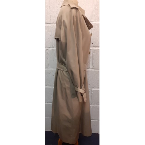 12 - Burberry-A 1970's beige double breasted 'Kensington' lightweight cotton trench coat having brown lea... 