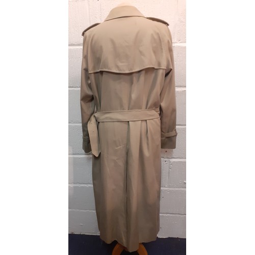 12 - Burberry-A 1970's beige double breasted 'Kensington' lightweight cotton trench coat having brown lea... 