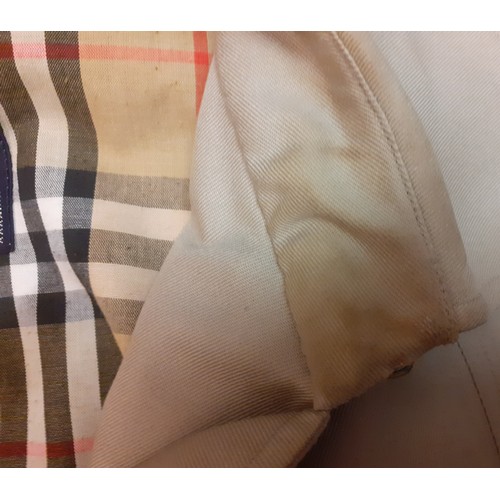 12 - Burberry-A 1970's beige double breasted 'Kensington' lightweight cotton trench coat having brown lea... 