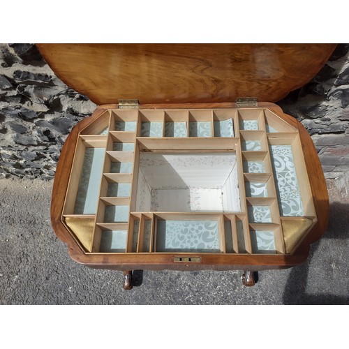 19 - A Victorian burr walnut marquetry inlaid work table having a hinged top and later fitted interior, 7... 