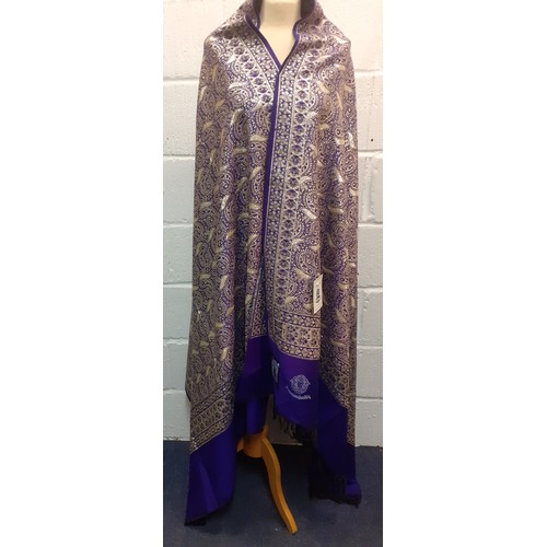 21 - An Emirates Kashmir Shawl Centre superior quality Indian Kashmir shawl in purple with silver coloure... 