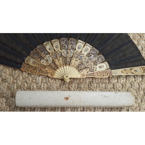 16 - An early 20th Century Chinese inspired fan having 14 composite cut-out wands in an Oriental design w... 