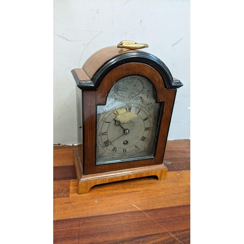 297 - A Samuel Marti walnut cased mantel clock, 23cm h
Location:5.4
If there is no condition report shown,... 