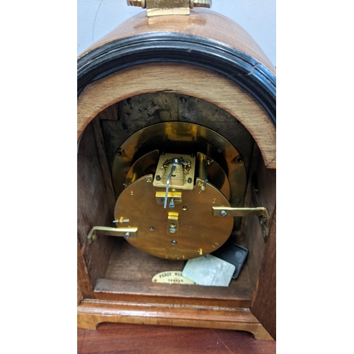 297 - A Samuel Marti walnut cased mantel clock, 23cm h
Location:5.4
If there is no condition report shown,... 