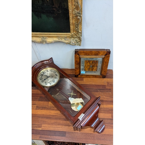 300 - An early 20th century mahogany cased Vienna regulator style clock and an Art Deco walnut cased barom... 