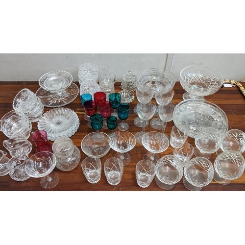 309 - Glassware to include Cranberry and green glass wines, bowls and a set of six wines and others
Locati... 