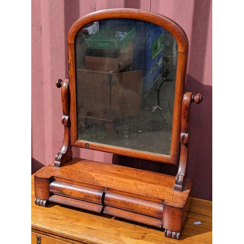 278 - A Victorian walnut dressing table swing mirror having two cushion moulded drawers, 74cm high x 57cm ... 