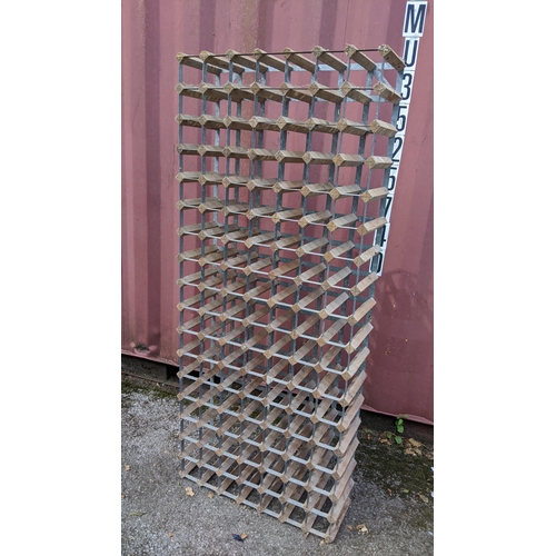 284 - A large floor standing wine rack, 166cm wide x 70cm wide
Location:RC
If there is no condition report... 