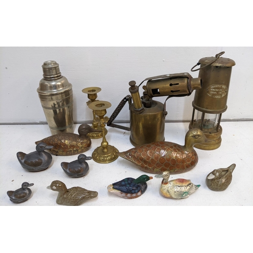 317 - A collection of metalware to include a Ferndale coal miners lamp, a 1926 British Monitor blowtorch, ... 