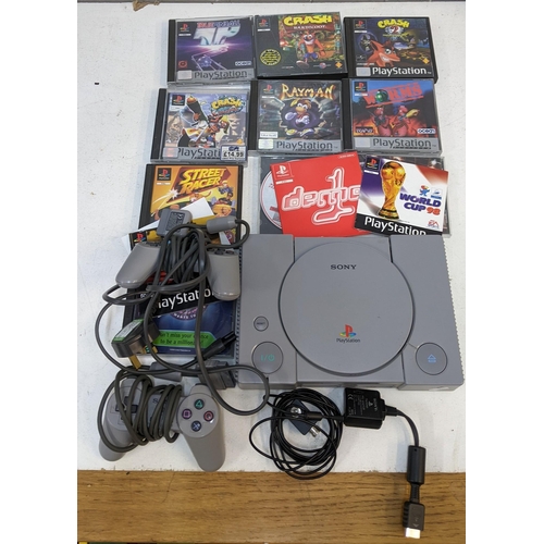 321 - A Playstation 1 console with games and controllers
Location:1.4
If there is no condition report show... 