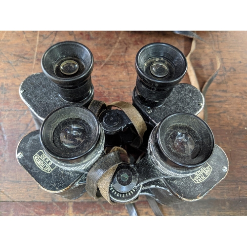 267 - Two pairs of binoculars and a silver plated napkin ring Location:LAM
If there is no condition report... 