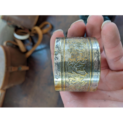 267 - Two pairs of binoculars and a silver plated napkin ring Location:LAM
If there is no condition report... 