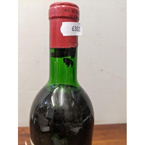 38 - A single bottle of 1970 Chateau Grand-Puy-Lacoste  
Location:L3, Blue Shelves