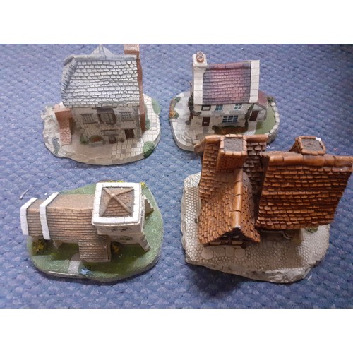 240 - A collection of ornamental buildings to include Lilliput Lane and a 1985 Naturecraft Dr Grey GP hous... 