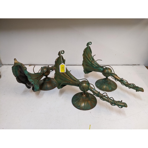 525 - A group of three patinated green and gold metal wall lights Location:A4F
If there is no condition re... 